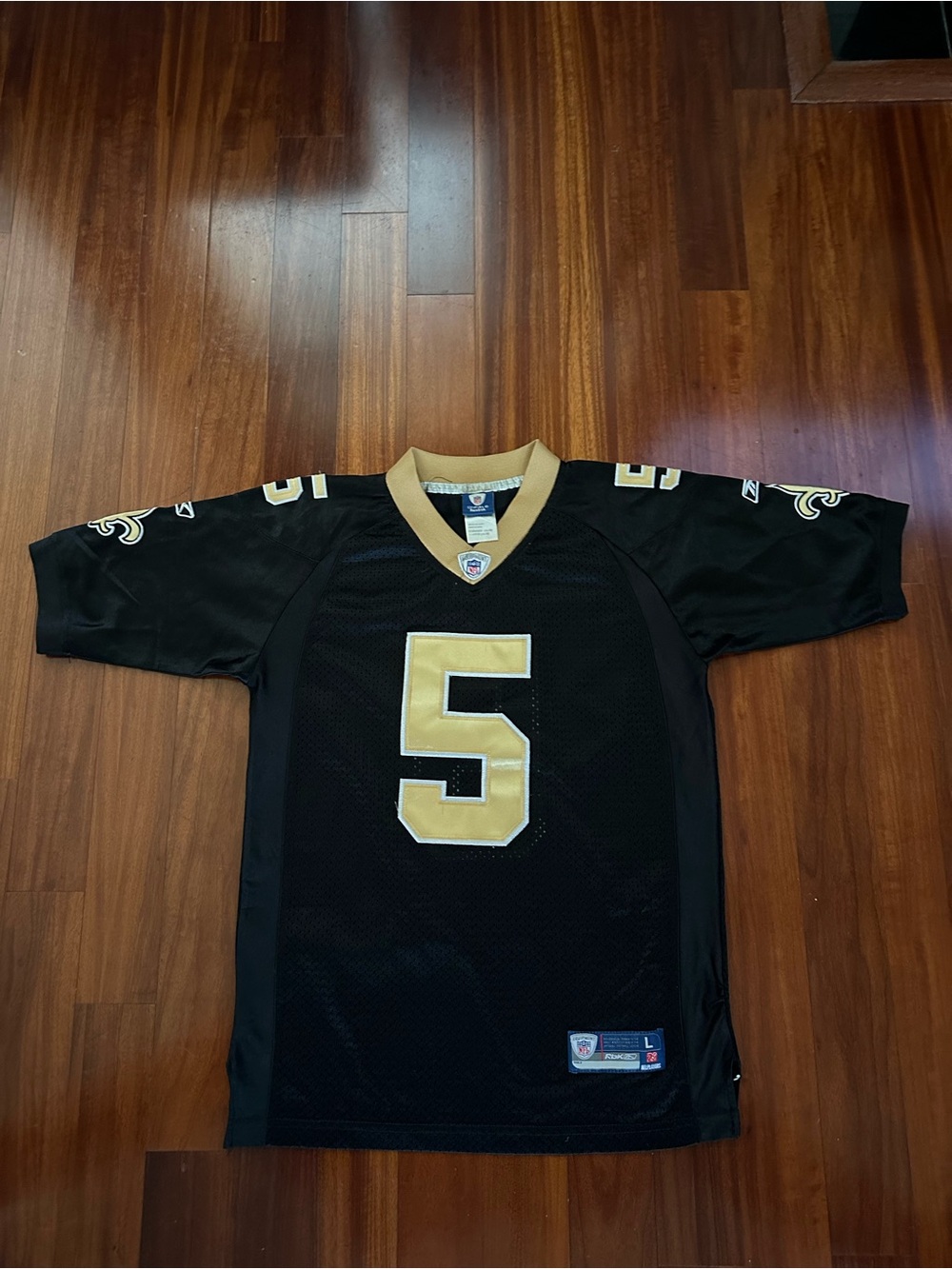 Saints Youth Reebok Hartley Black and Gold Football Jersey with Number 5 unisex